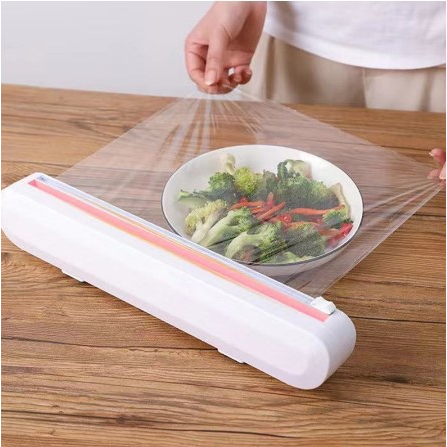 Cortador de Filme PVC com Ventosa Aderente – Suporte Ajustável, Prático e Higiênico para sua Cozinha Moderna!